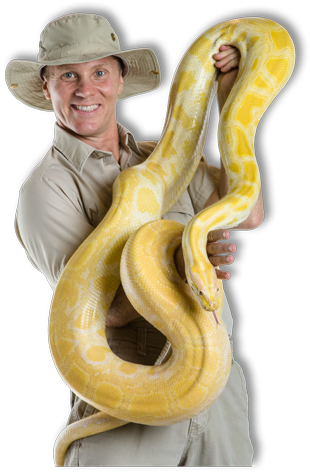 Outback Ray holds up a snake